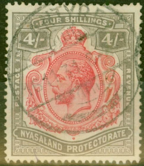 Rare Postage Stamp from Nyasaland 1927 4s Carmine & Black SG111f Damaged Leaf Bottom Right V.F.U